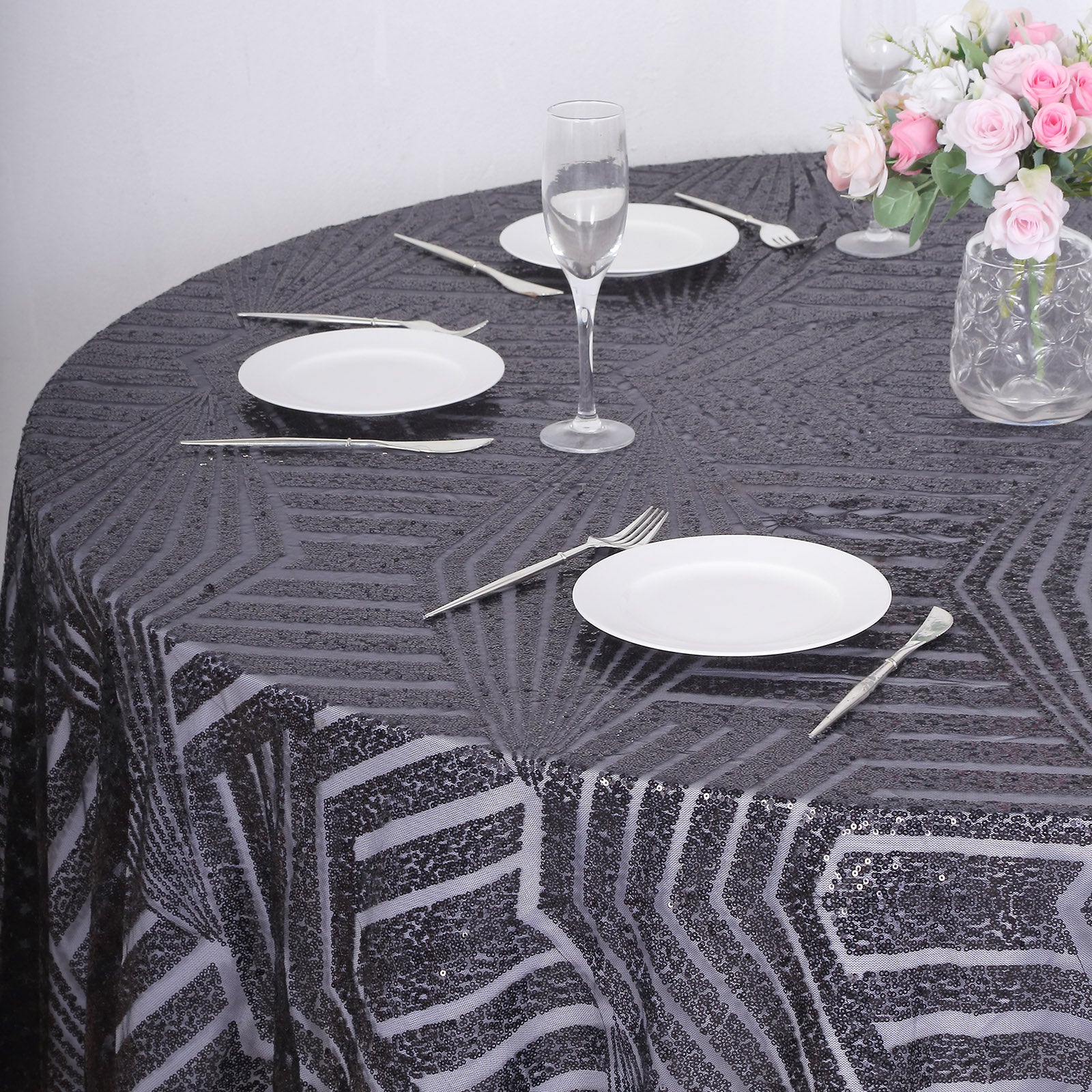 Black sequin round tablecloth with diamond glitz design.