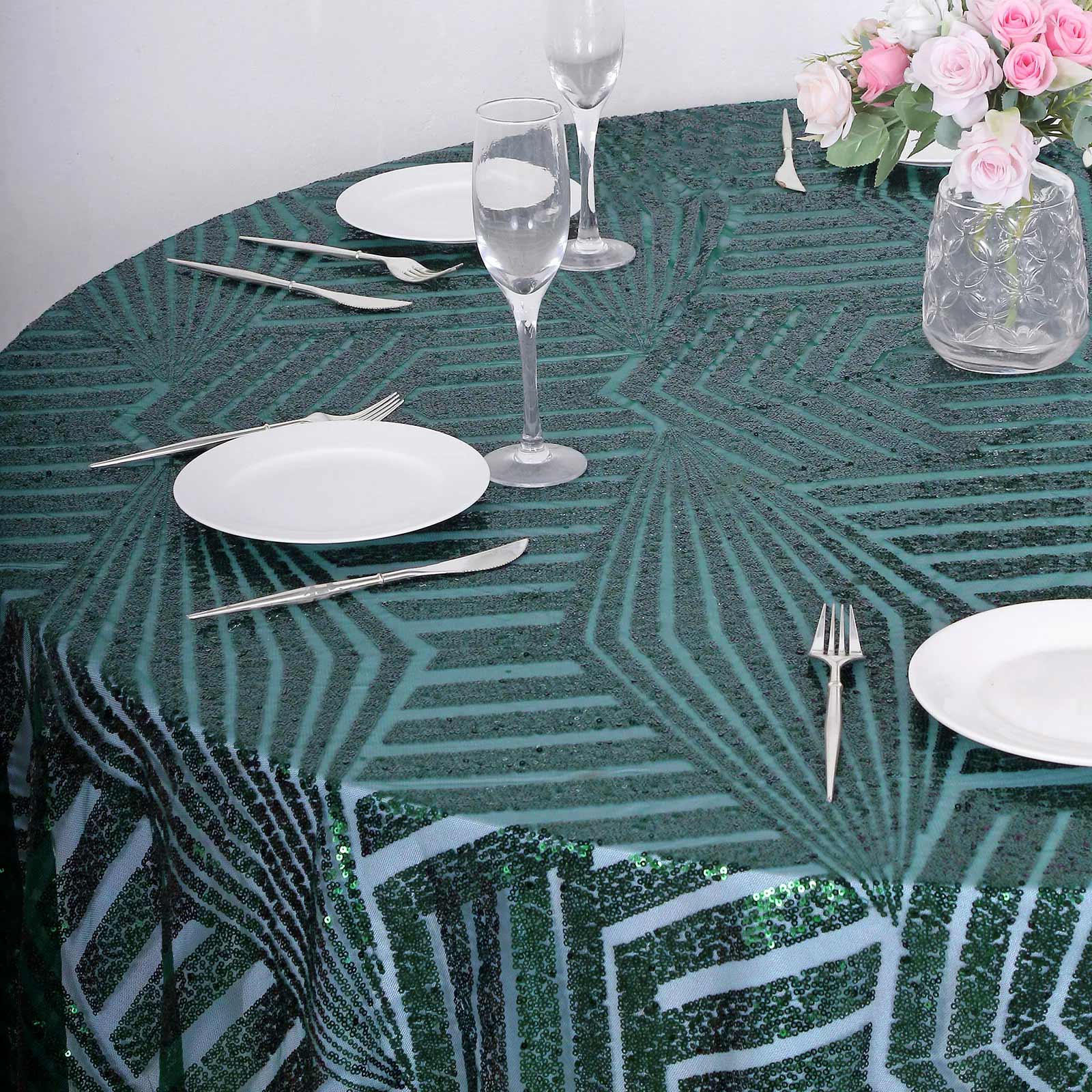 120" Hunter Emerald Green Sequin Round Tablecloth on a dining table.