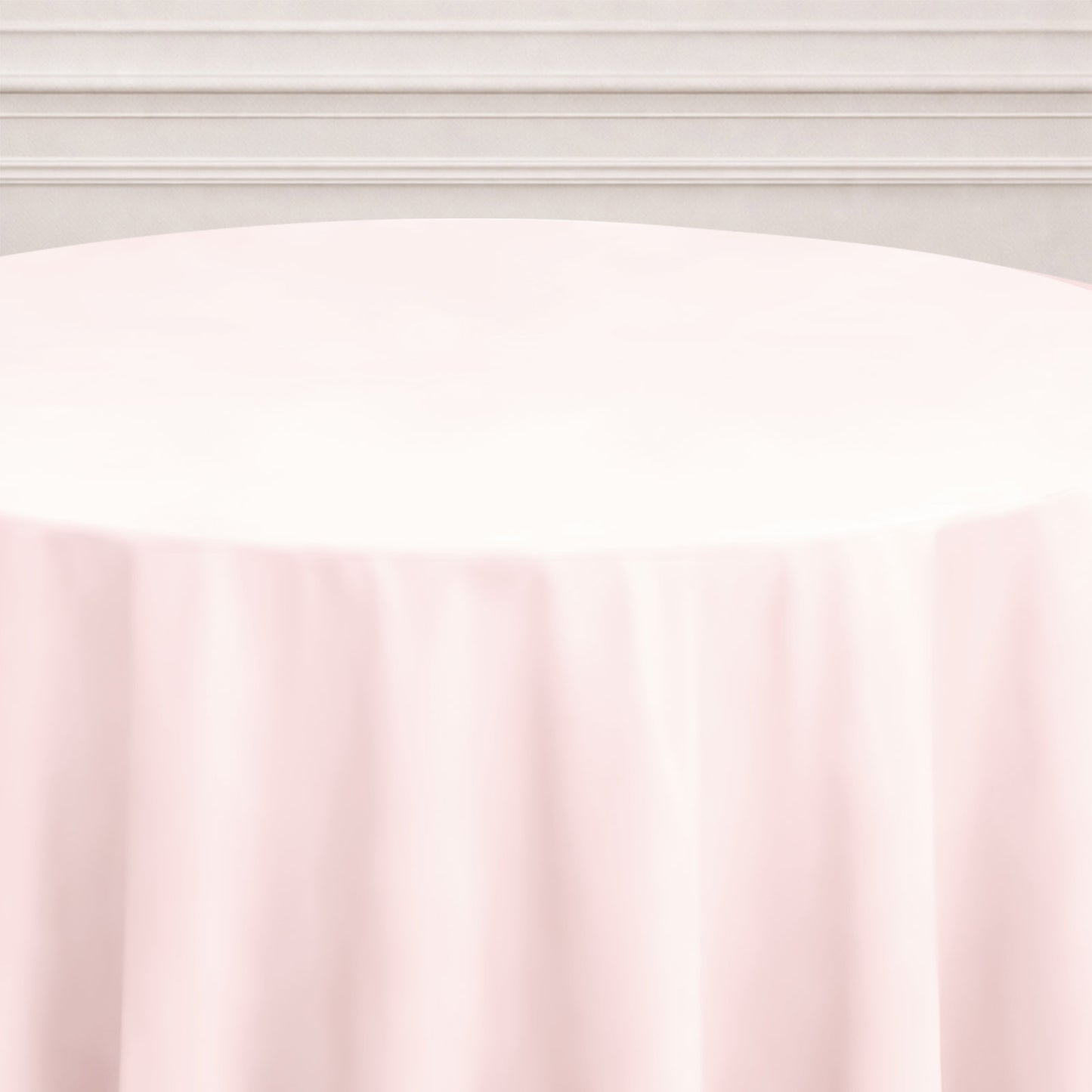 Blush round tablecloth for elegant table settings.