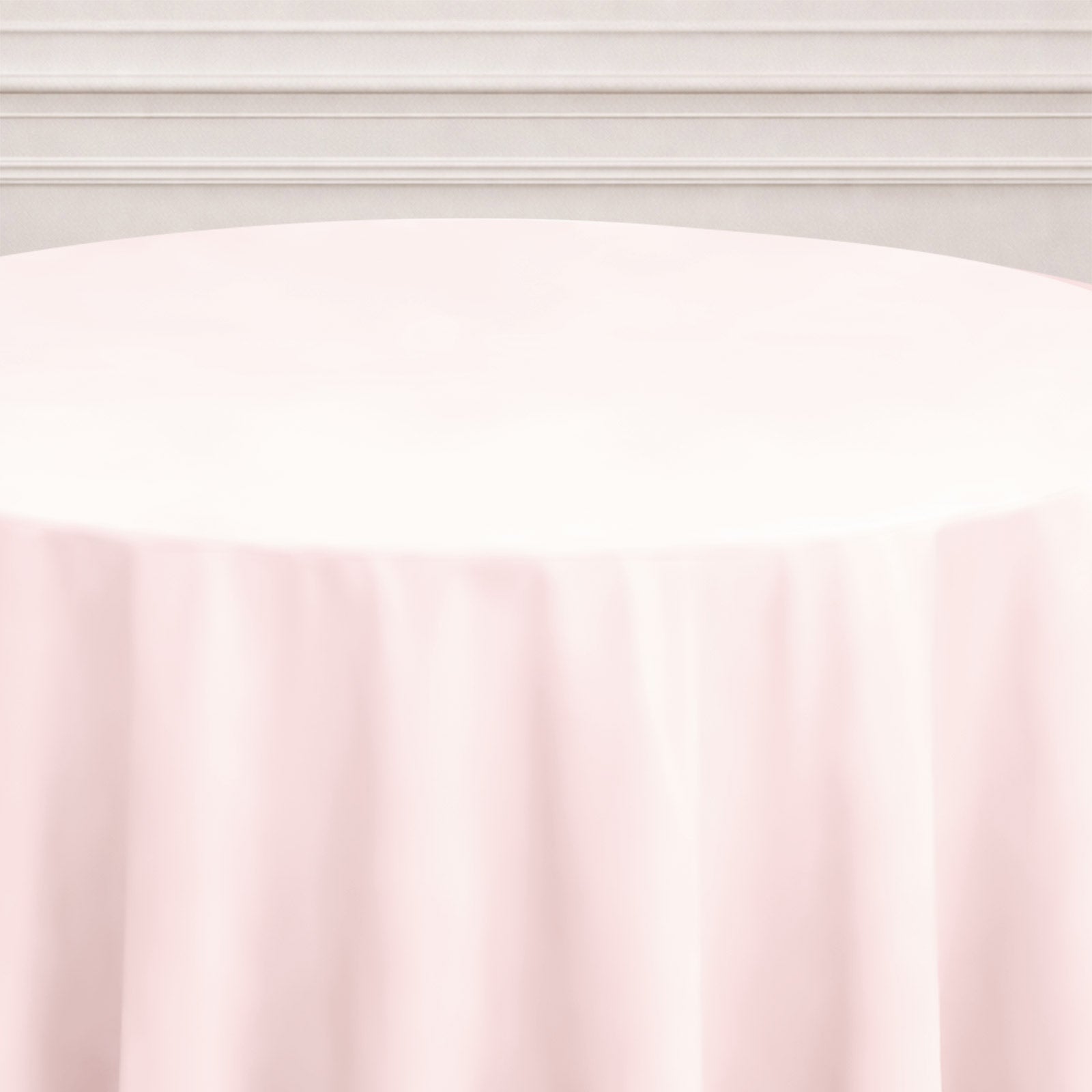 Blush round tablecloth for elegant table settings.