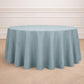 Dusty blue seamless polyester round tablecloth on a wooden floor.