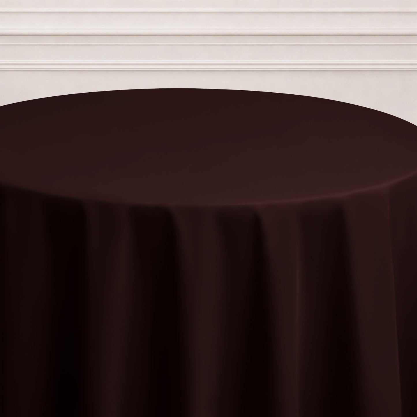 Chocolate round tablecloth on a table.