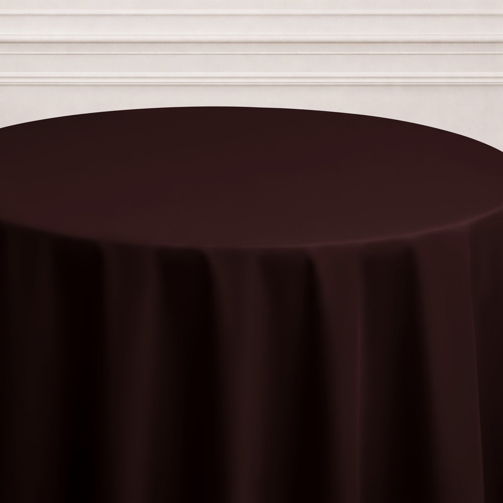 Chocolate round tablecloth on a table.
