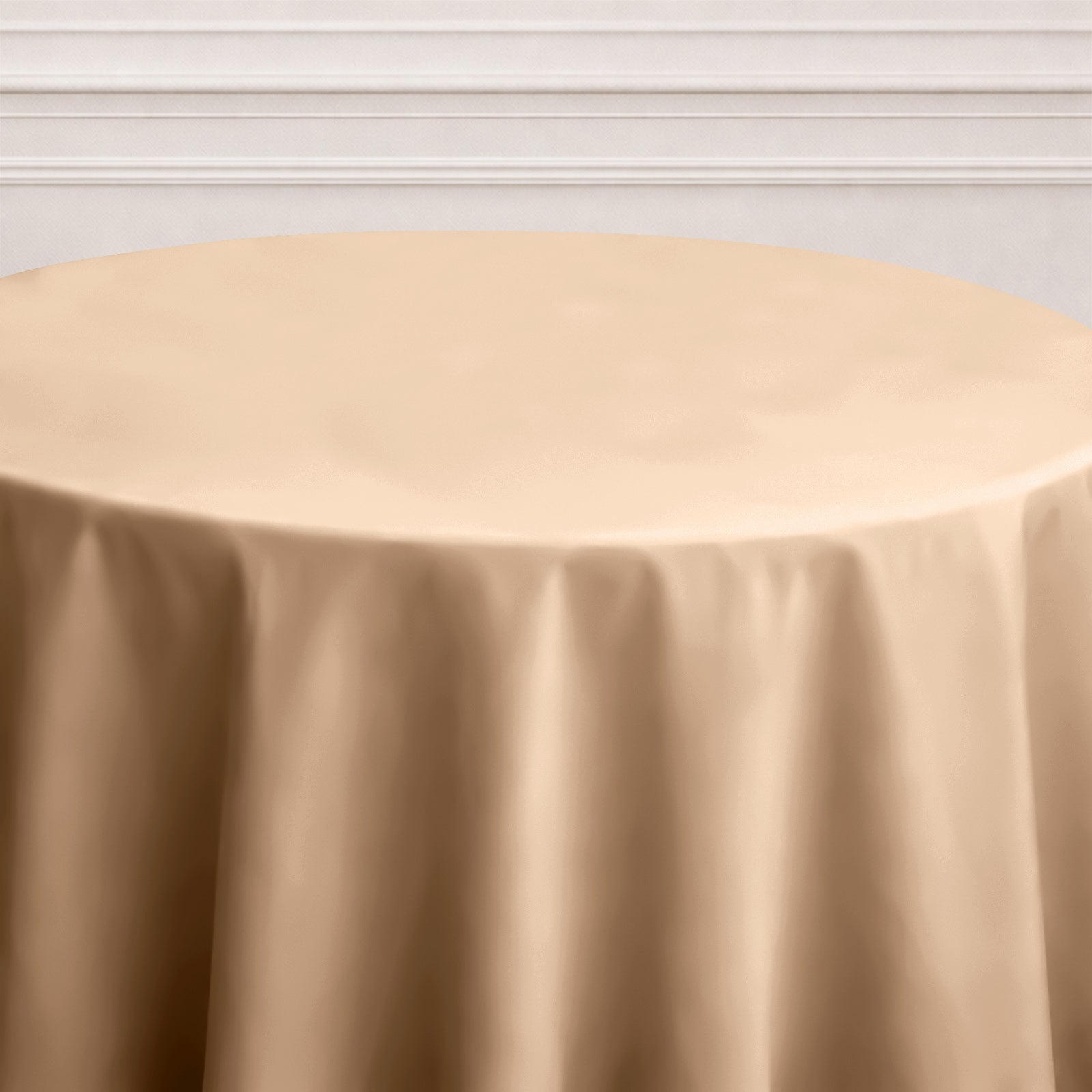Nude seamless polyester round tablecloth for elegant dining settings.