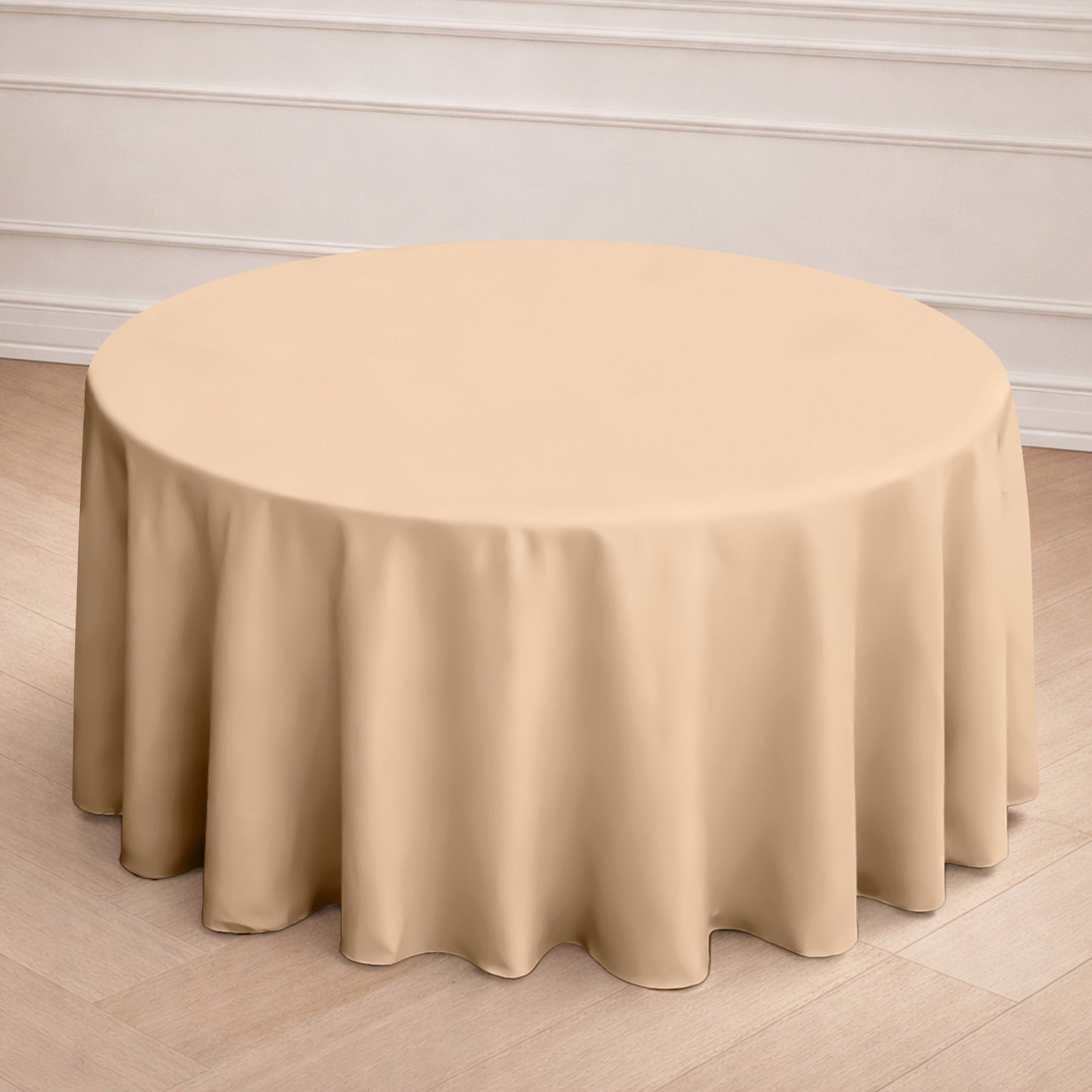 Nude seamless round tablecloth for elegant dining settings.