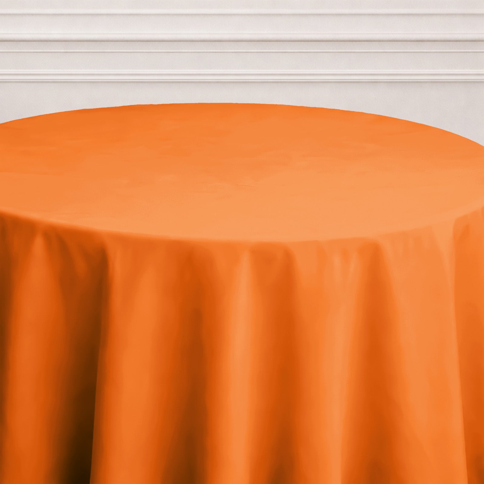 Orange round tablecloth for events and dining.