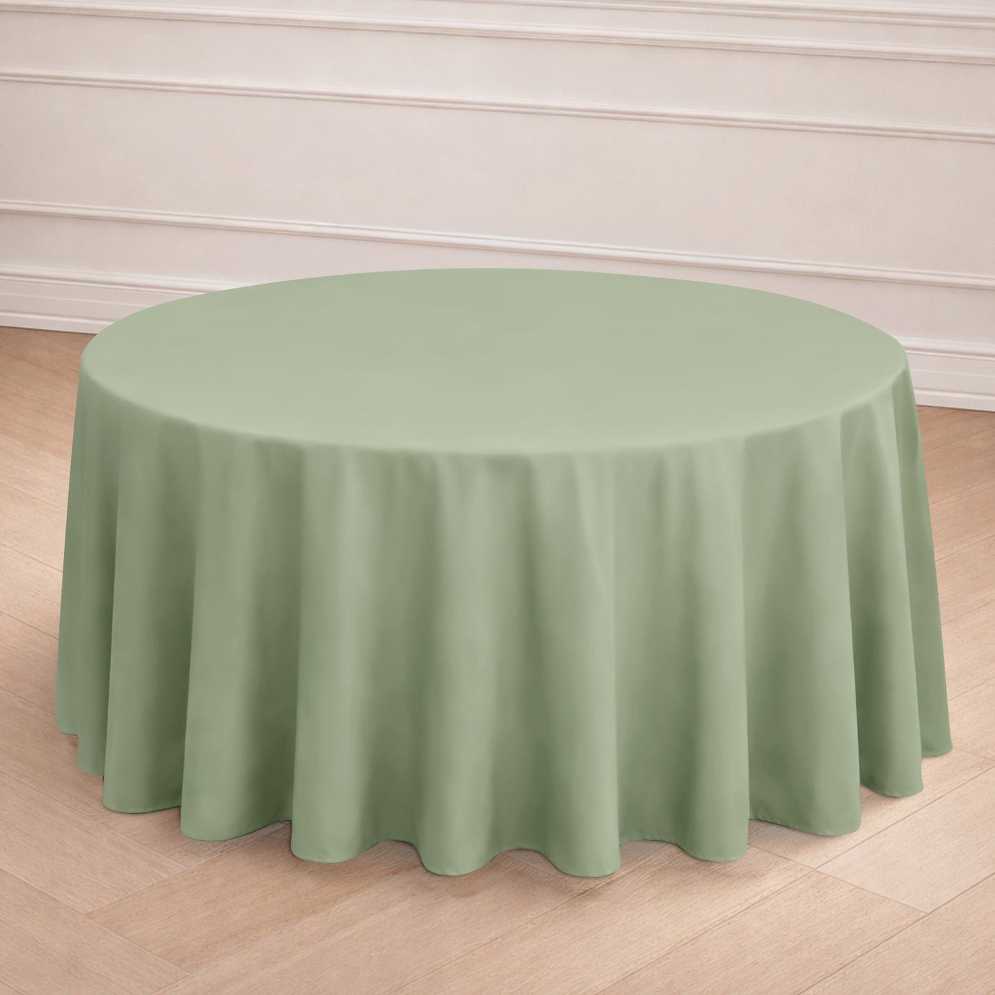 120" sage green seamless polyester round tablecloth on a round table.