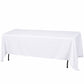 White premium polyester rectangular tablecloth on a table.