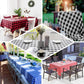 Black and red buffalo plaid tablecloth on various table settings.