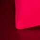 Glow Neon Fuchsia Fitted Spandex Cocktail Tablecloth on a round table.