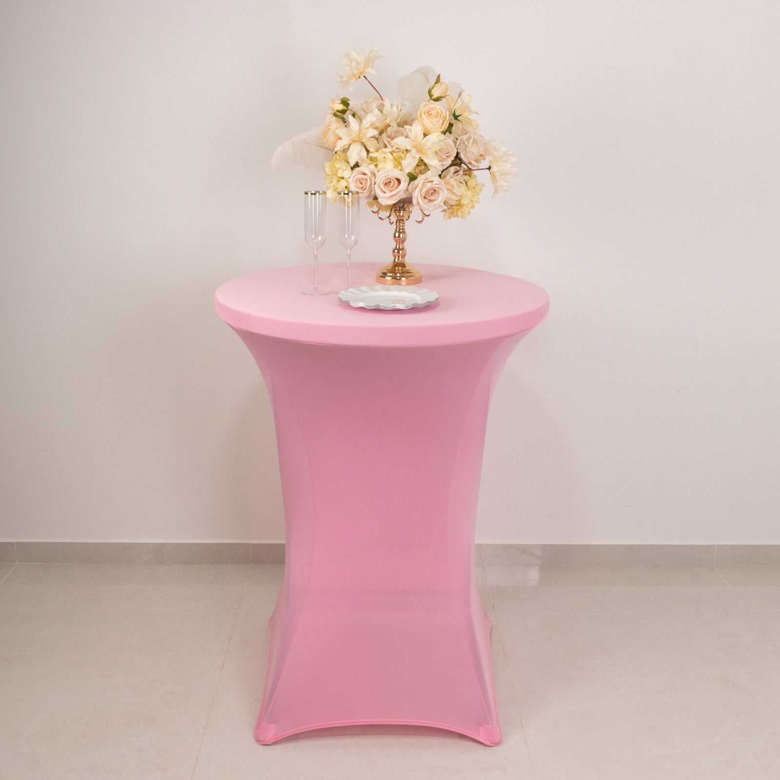 Pink fitted stretch tablecloth for 30" high top tables.