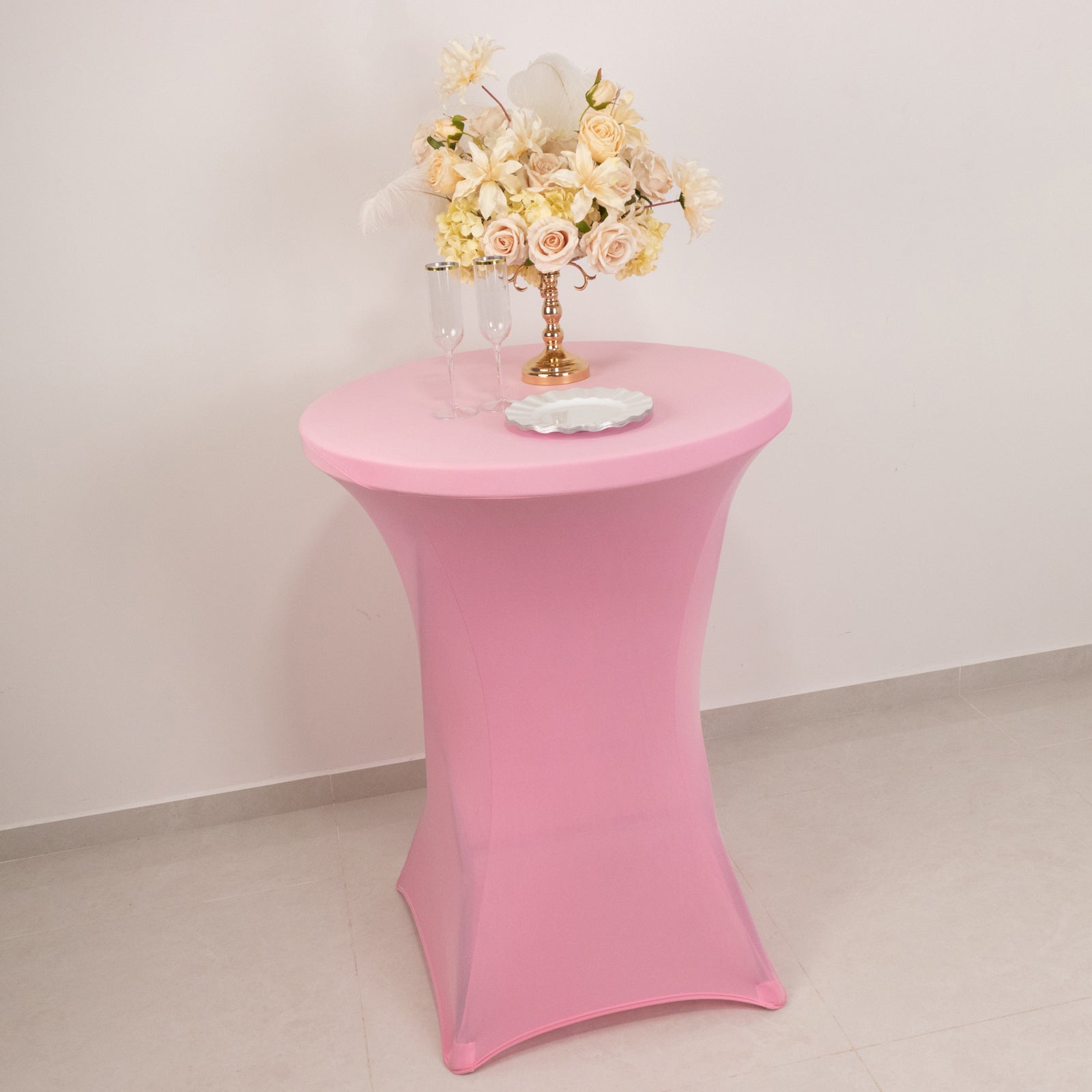 Pink fitted stretch tablecloth for 30" high top table.