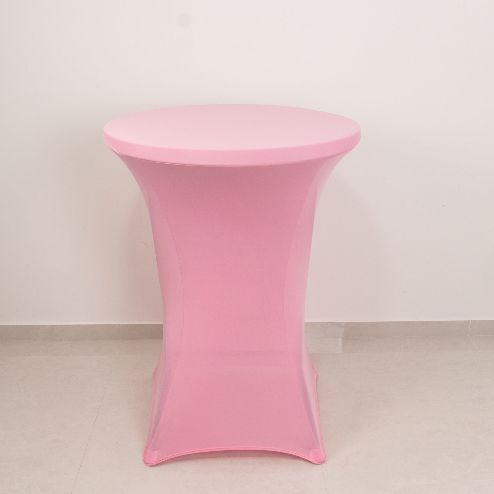 Pink fitted stretch tablecloth for 30" high top tables.