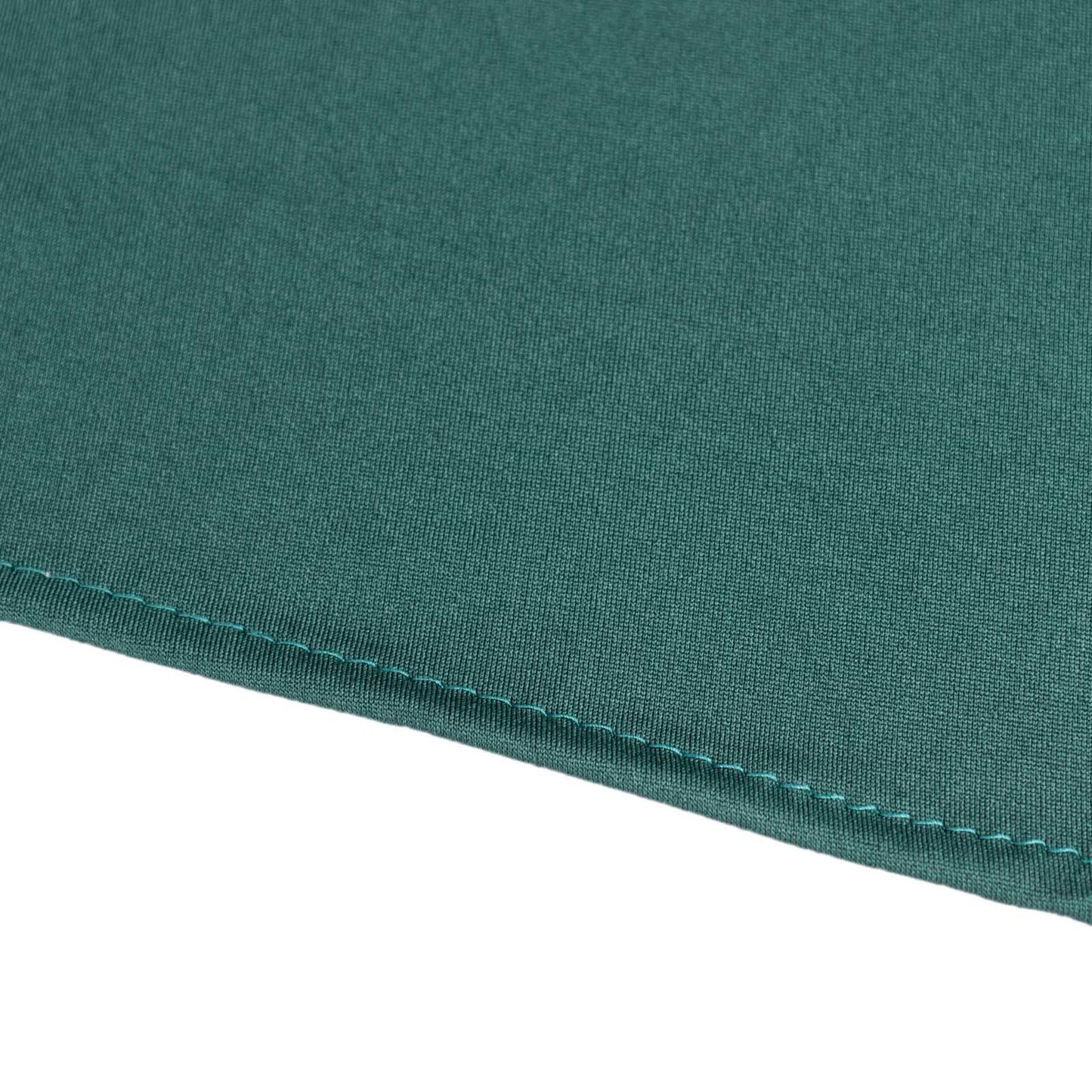 Hunter emerald green cocktail table cover skirt with wavy drapes.