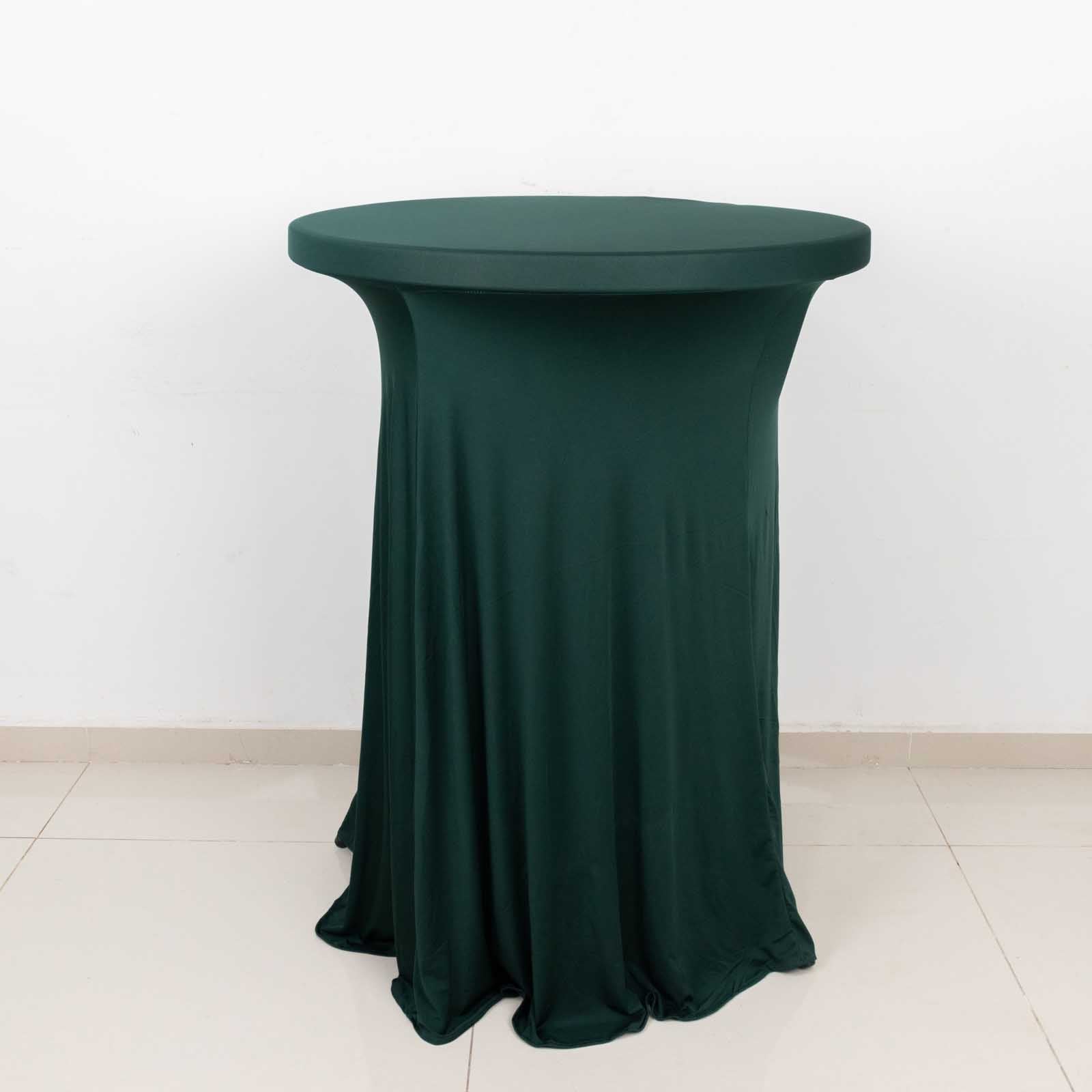 Hunter emerald green cocktail table cover with natural wavy drapes.