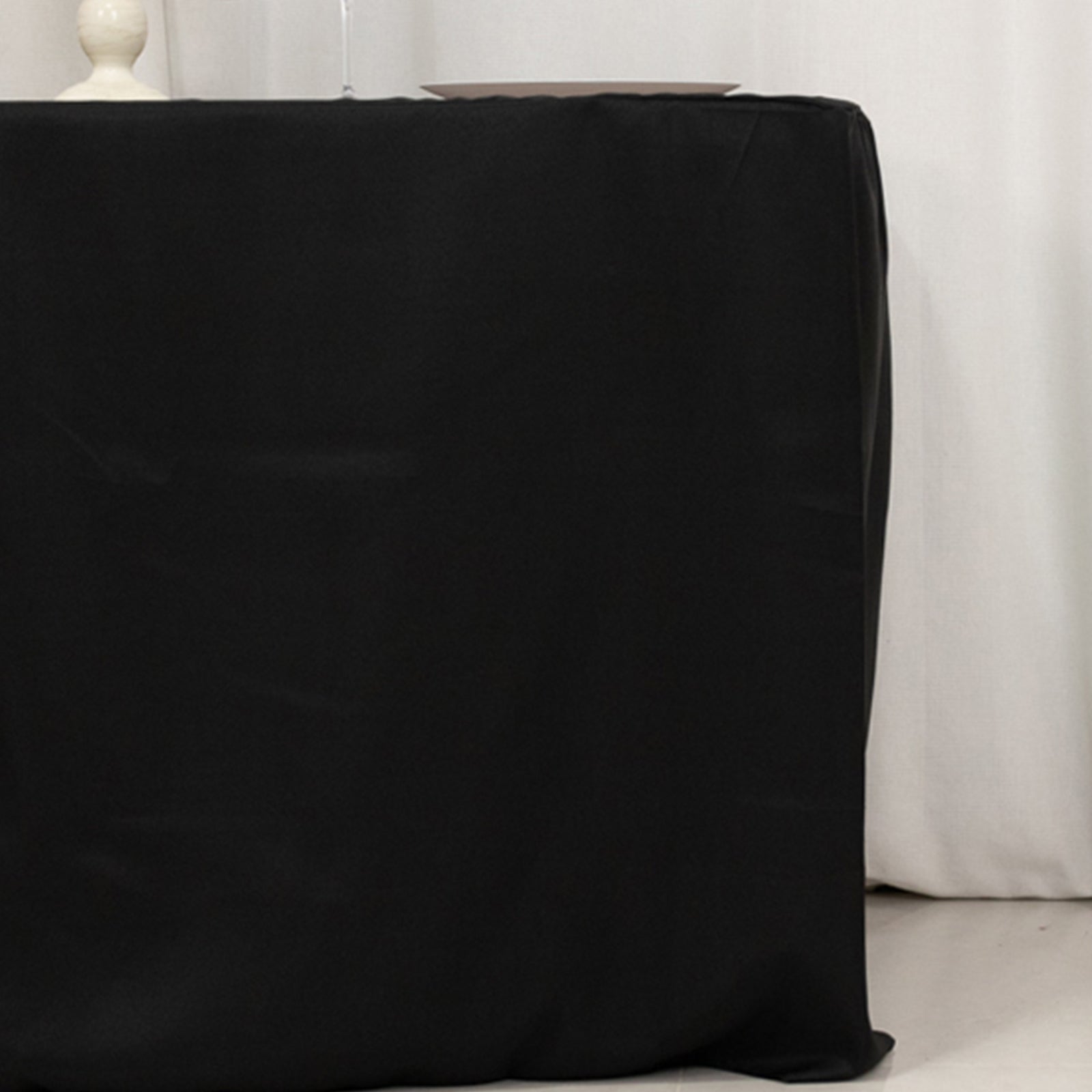 Black fitted tablecloth for 48"x24"x30" tables.