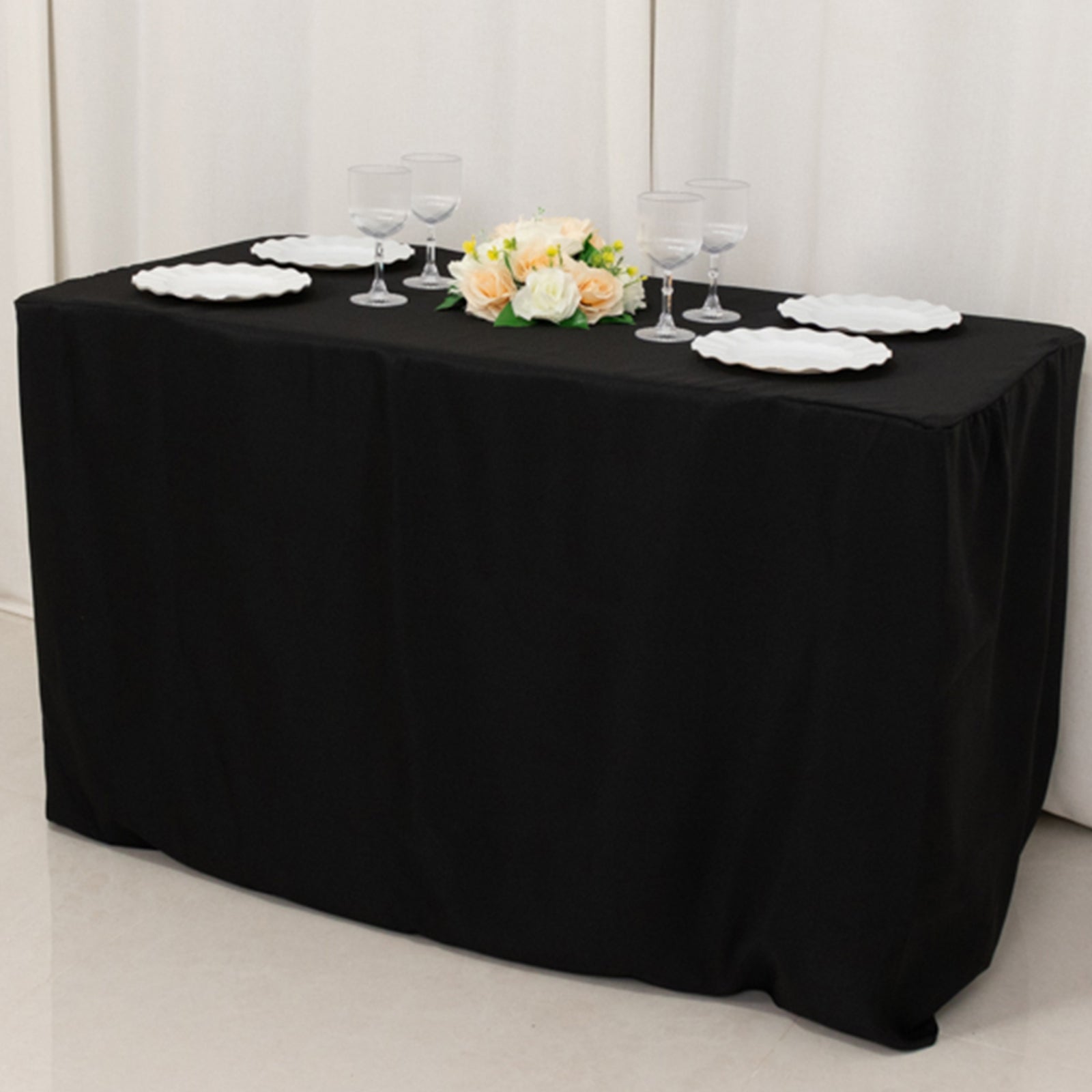 Black fitted polyester tablecloth for 48"x24"x30" tables.