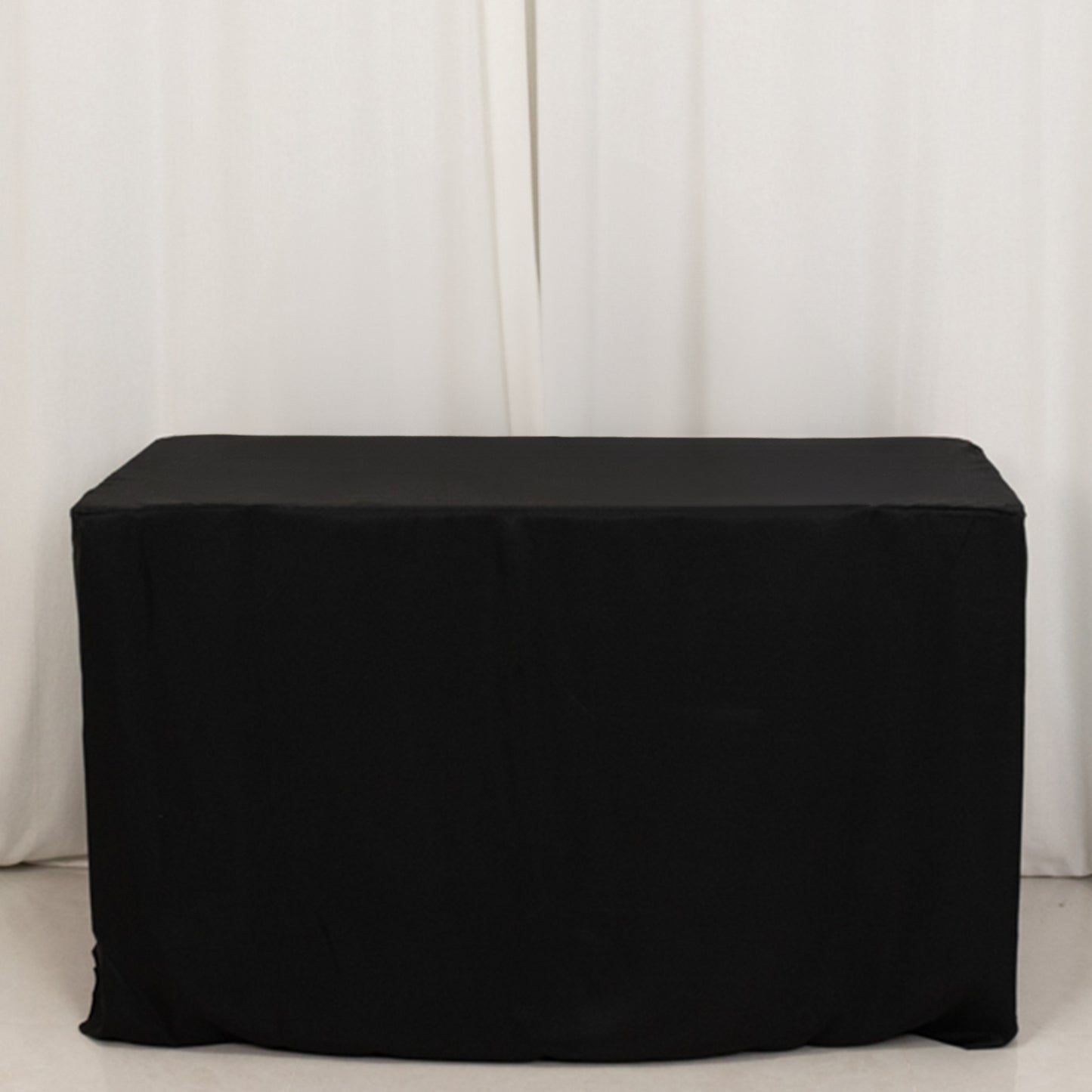 Black fitted tablecloth for 48"x24"x30" tables.