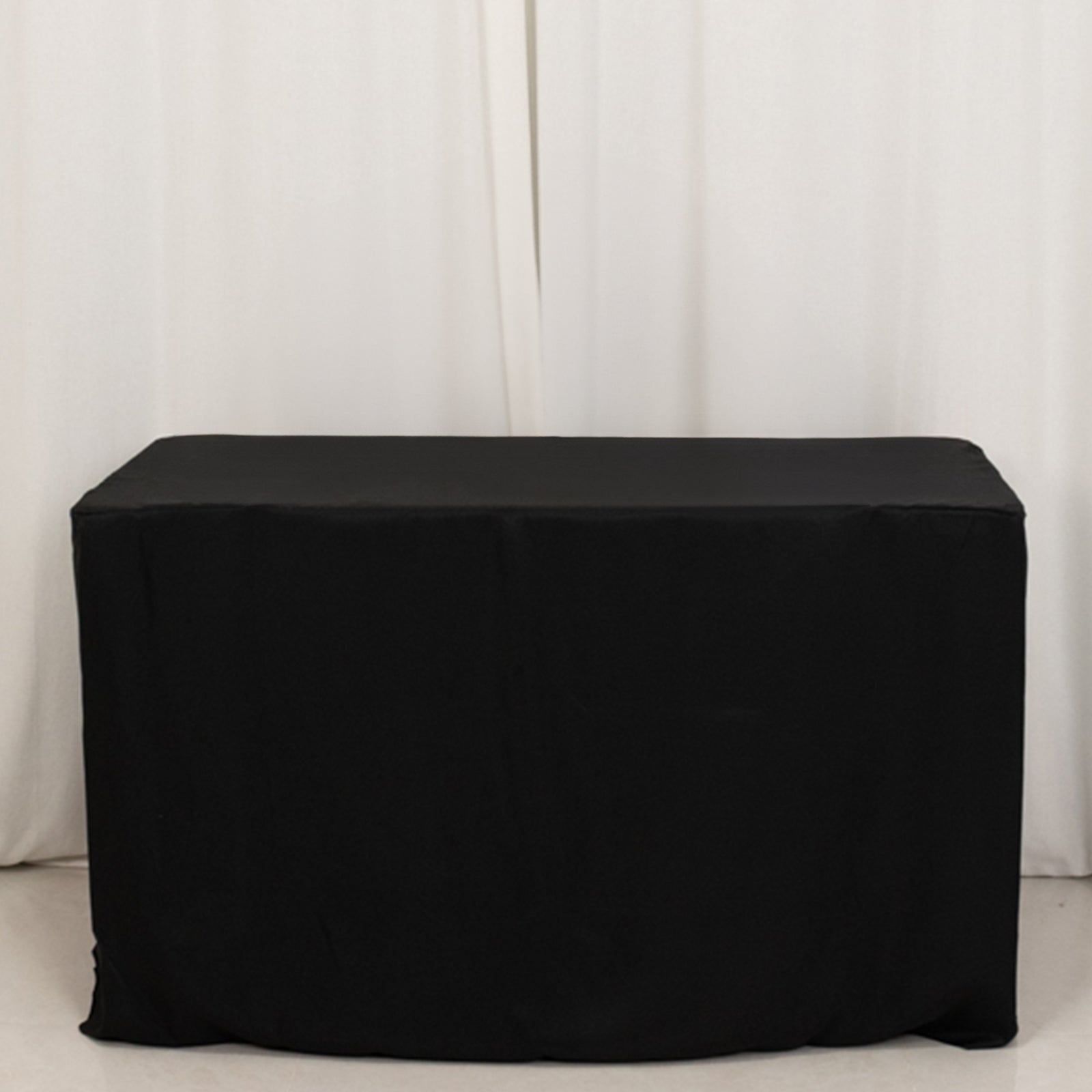 Black fitted tablecloth for 48"x24"x30" tables.