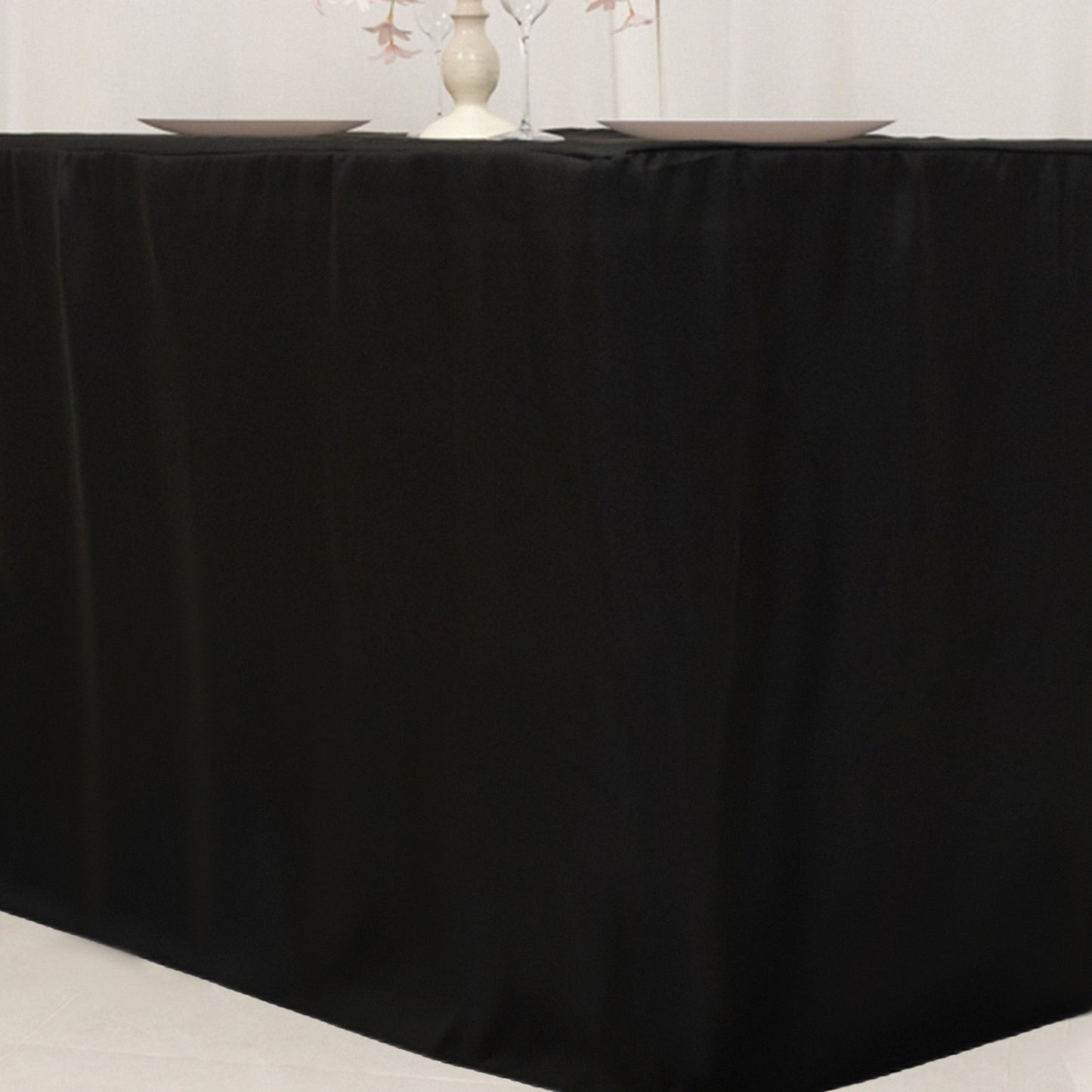 Black fitted tablecloth for 48"x24"x42" tables.