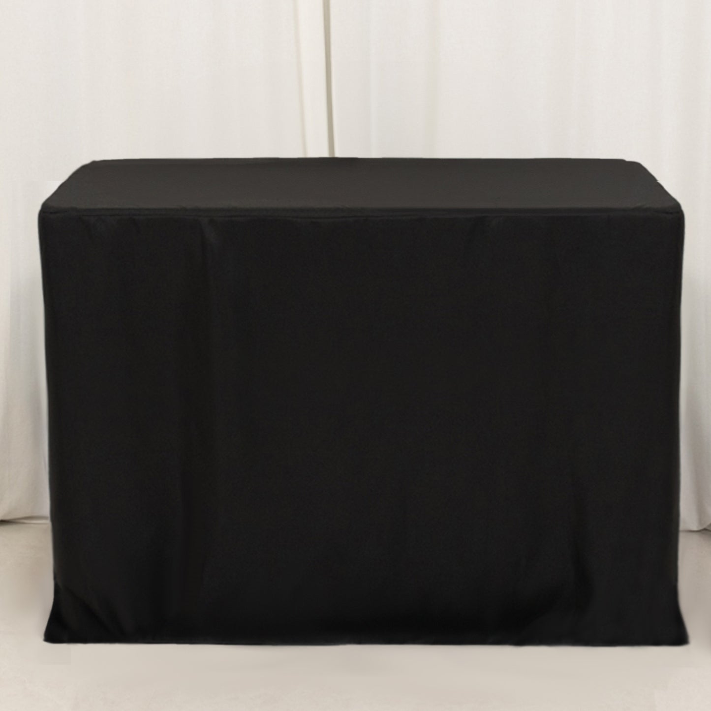 Black fitted polyester tablecloth for 48"x24"x42" tables.