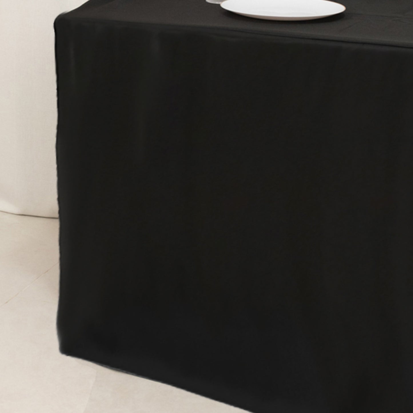 Black fitted polyester tablecloth for 72"x24"x42" tables.