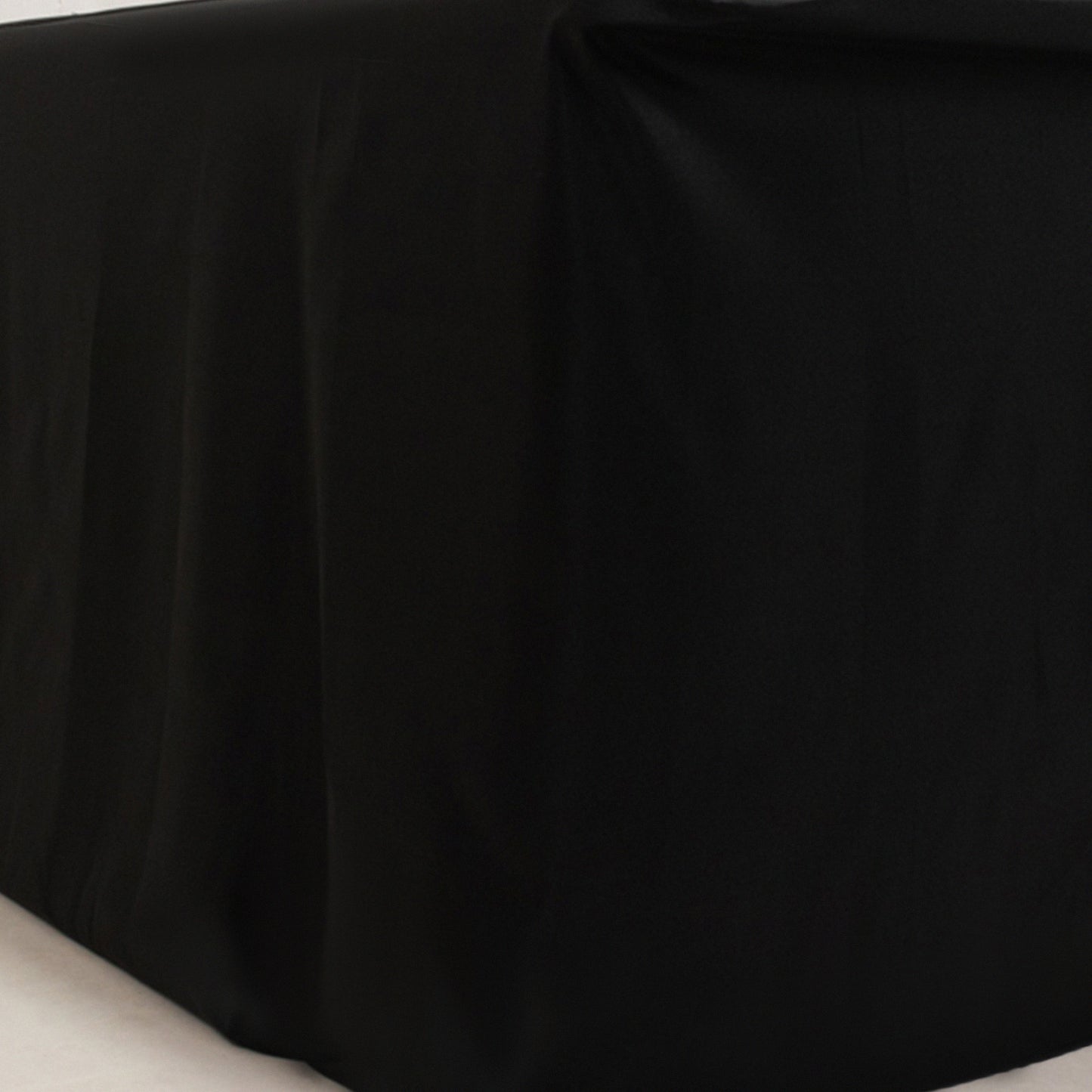 Black fitted polyester tablecloth for 72"x24"x42" tables.