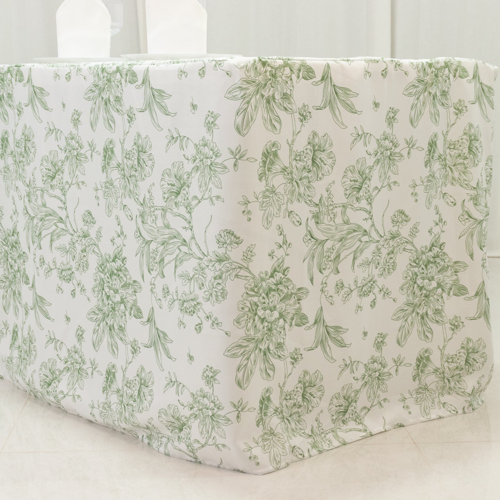 Dusty sage green and white floral fitted tablecloth.