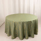 Dusty sage green round tablecloth with gold foil tree branch pattern.