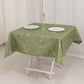 Dusty sage green tablecloth with gold foil tree branch pattern on a table.