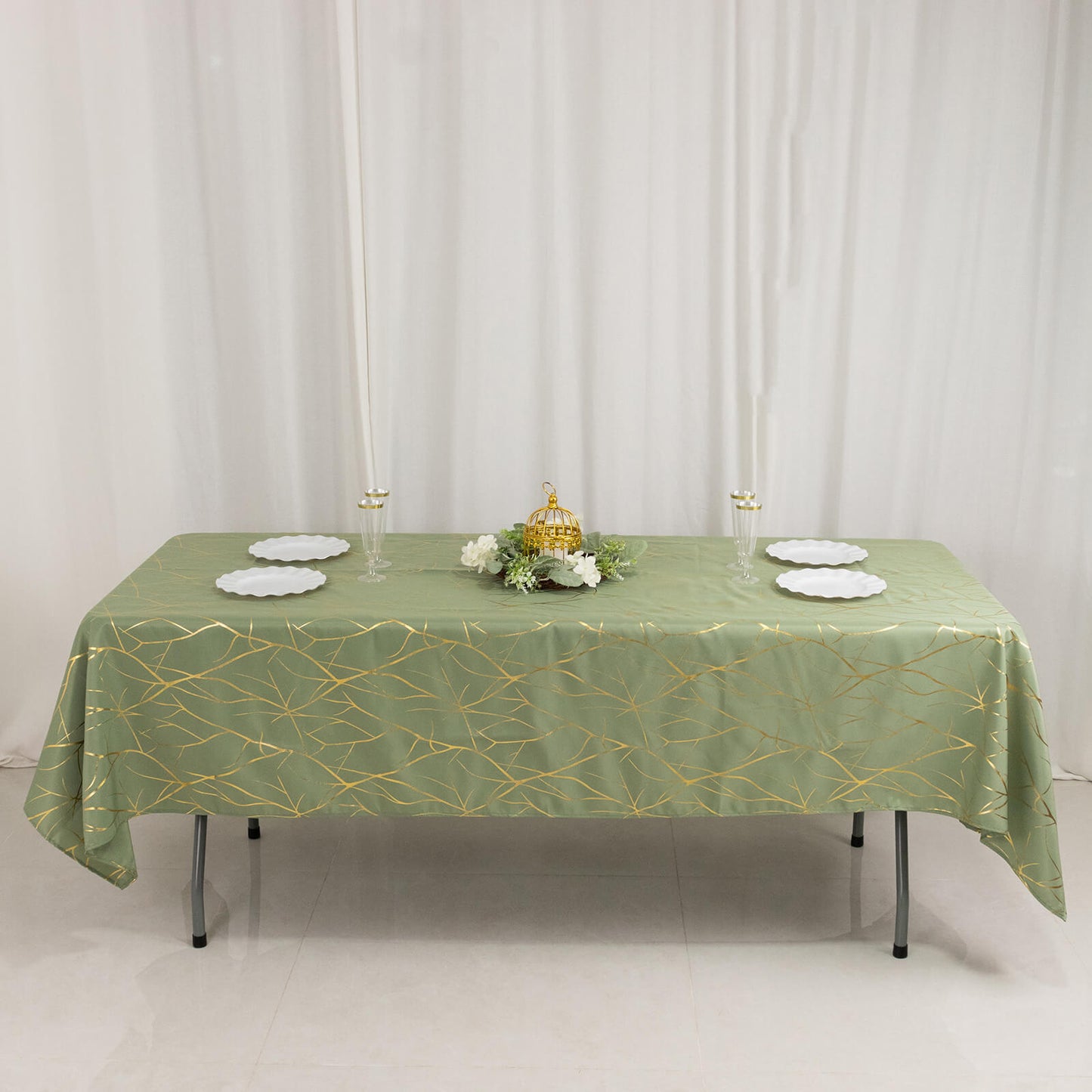 Dusty sage green tablecloth with gold foil tree branch pattern, 60"x102".