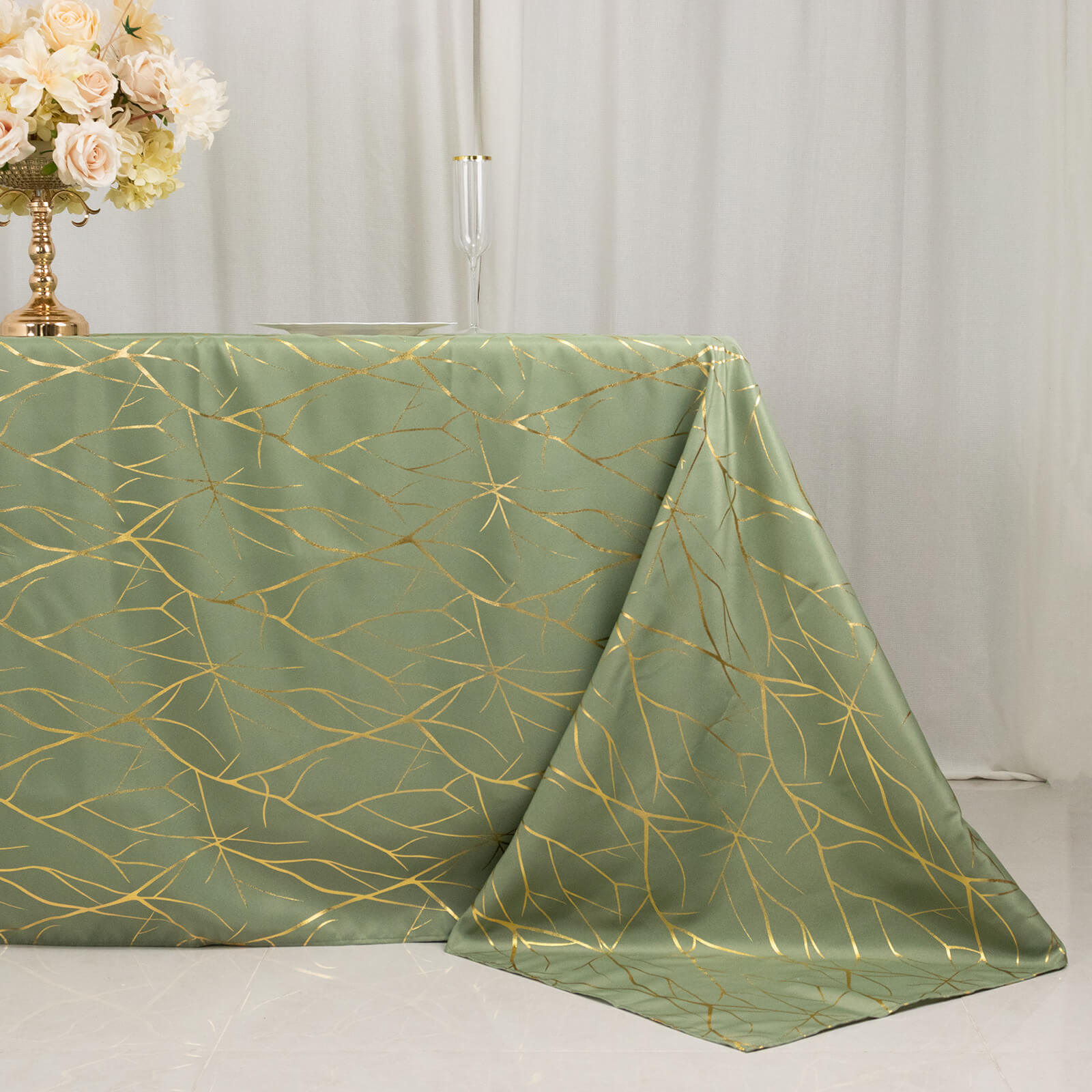 Dusty sage green tablecloth with gold foil tree branch pattern, 90"x132".