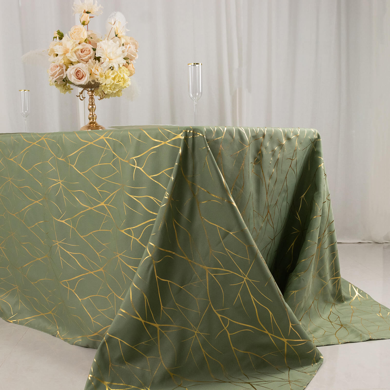 Dusty sage green tablecloth with gold foil tree branch pattern, 90"x132".