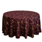 Burgundy round tablecloth with gold geometric pattern.