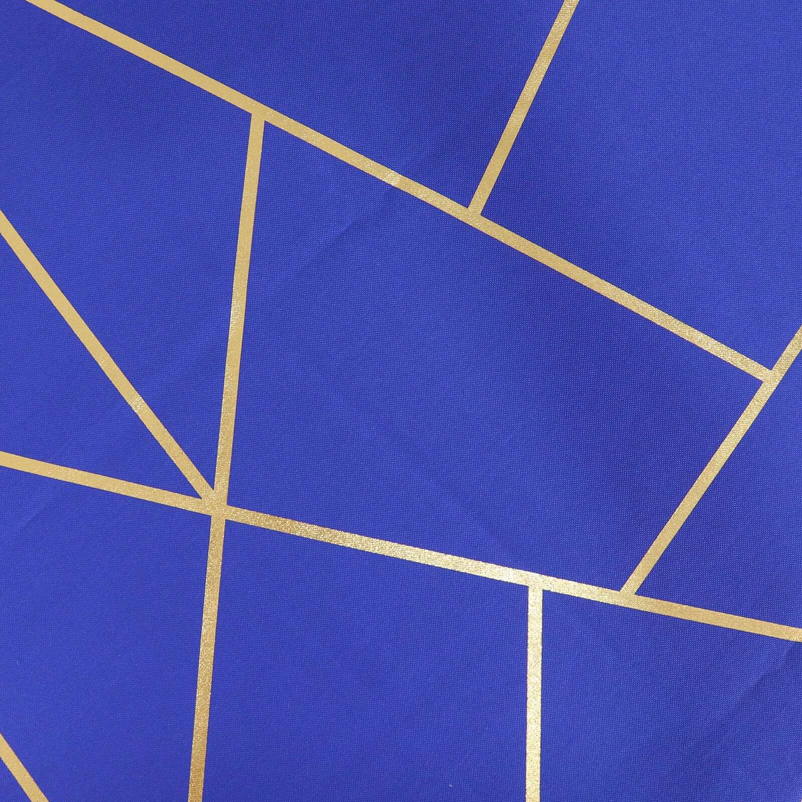 Royal blue tablecloth with gold foil geometric pattern.