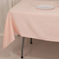 Blush satin rectangle tablecloth on a dining table.