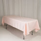 Blush satin rectangle tablecloth, 60"x102", elegant and smooth finish.