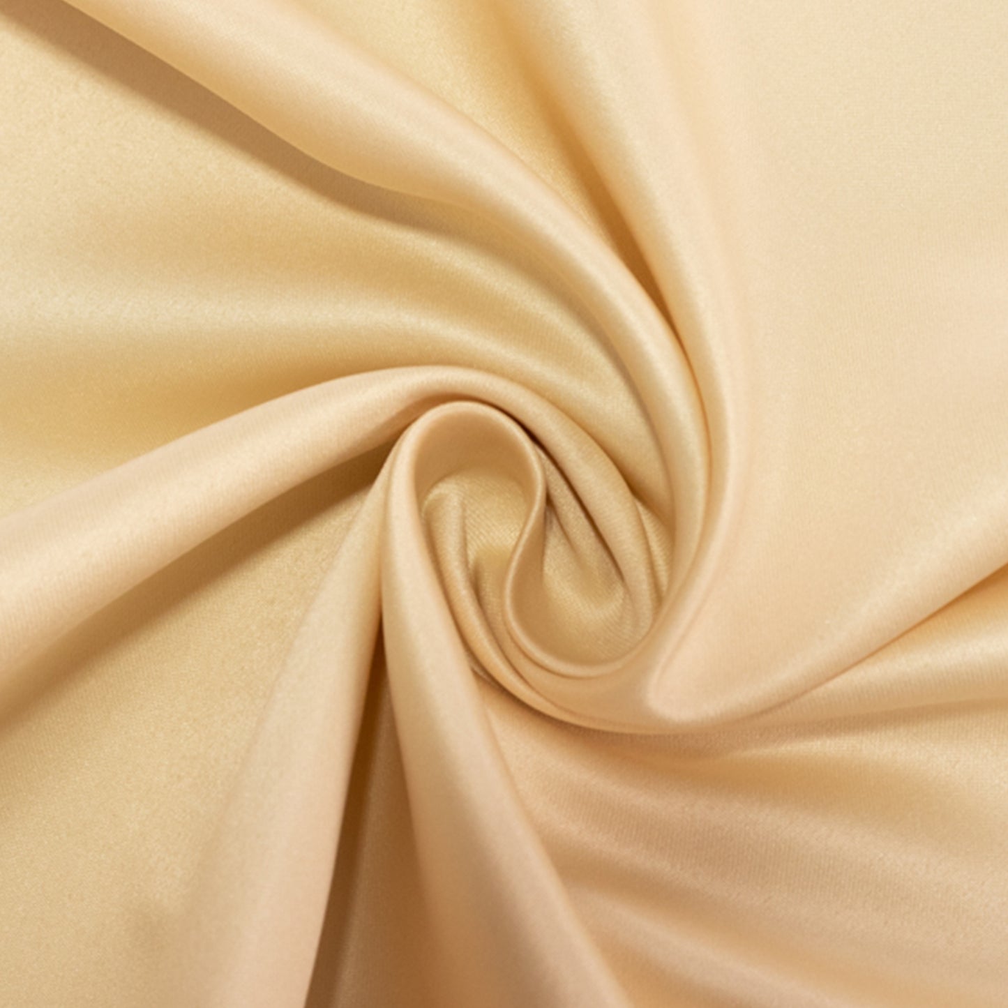 beige satin tablecloth fabric in a swirl pattern
