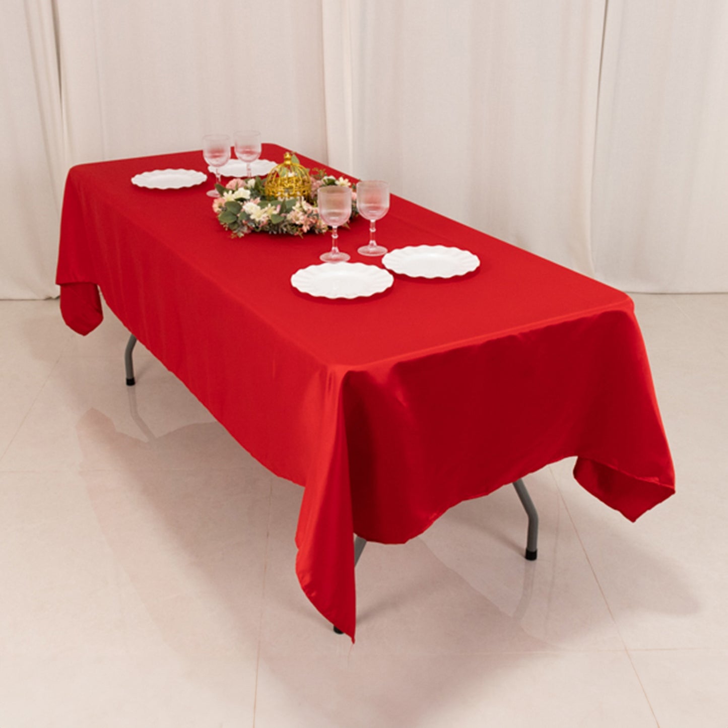Red rectangular tablecloth 60"x102" for elegant dining setups.