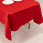 Red satin rectangle tablecloth on a table.