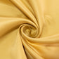 Champagne satin tablecloth fabric in a smooth, elegant swirl.