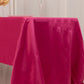 Fuchsia satin tablecloth for elegant dining events.