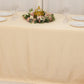 Beige seamless satin tablecloth for 6-foot table with floor-length drop.