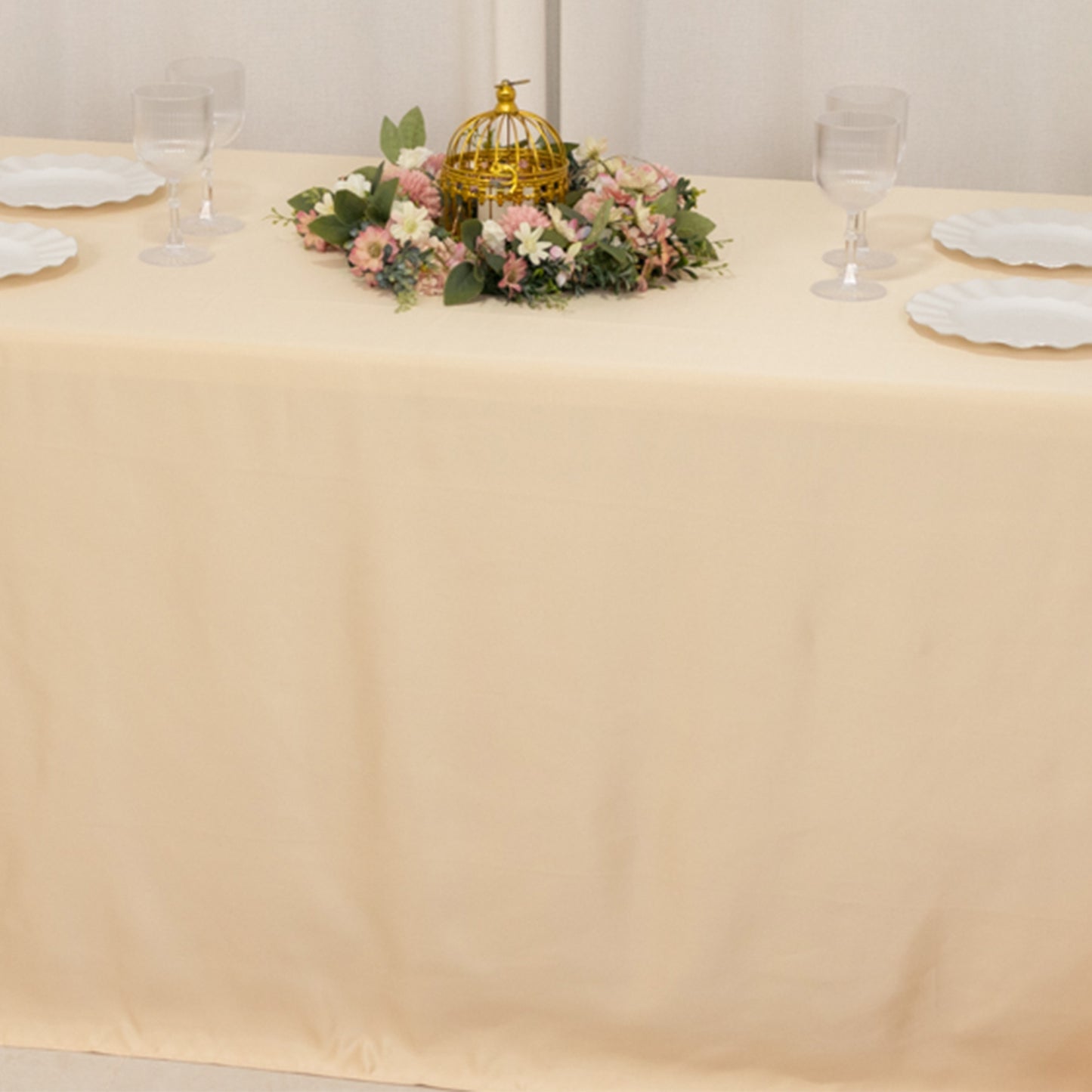 Beige seamless satin tablecloth for 6-foot table with floor-length drop.