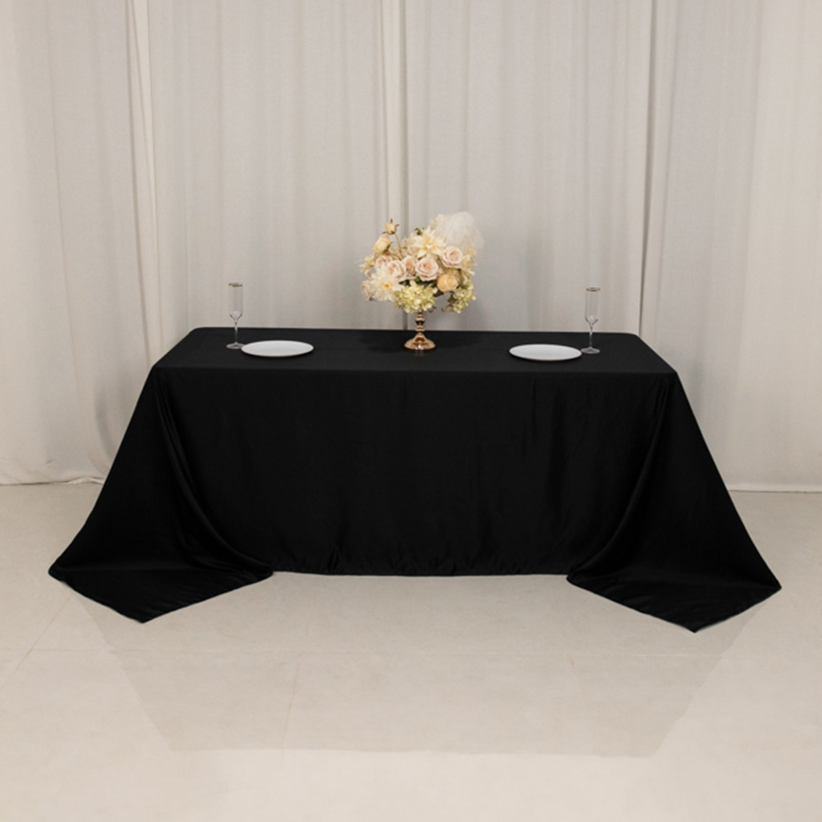 Black satin tablecloth for a 6-foot table with floor-length drop.