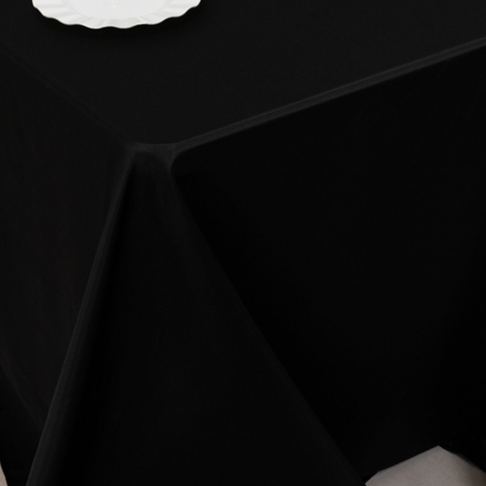 Black seamless satin rectangle tablecloth for a 6-foot table.