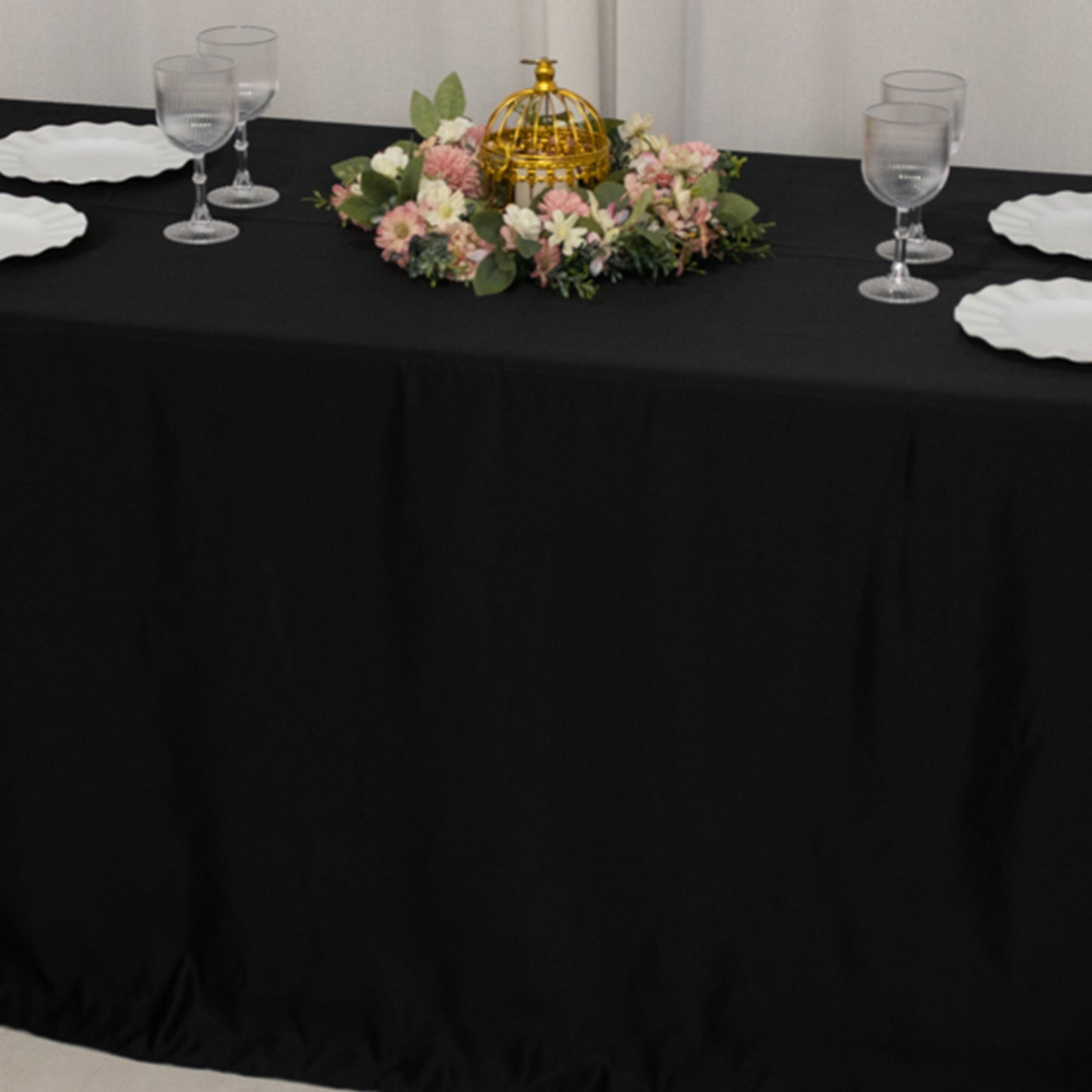 Black satin tablecloth for a 6-foot table with floral centerpiece.