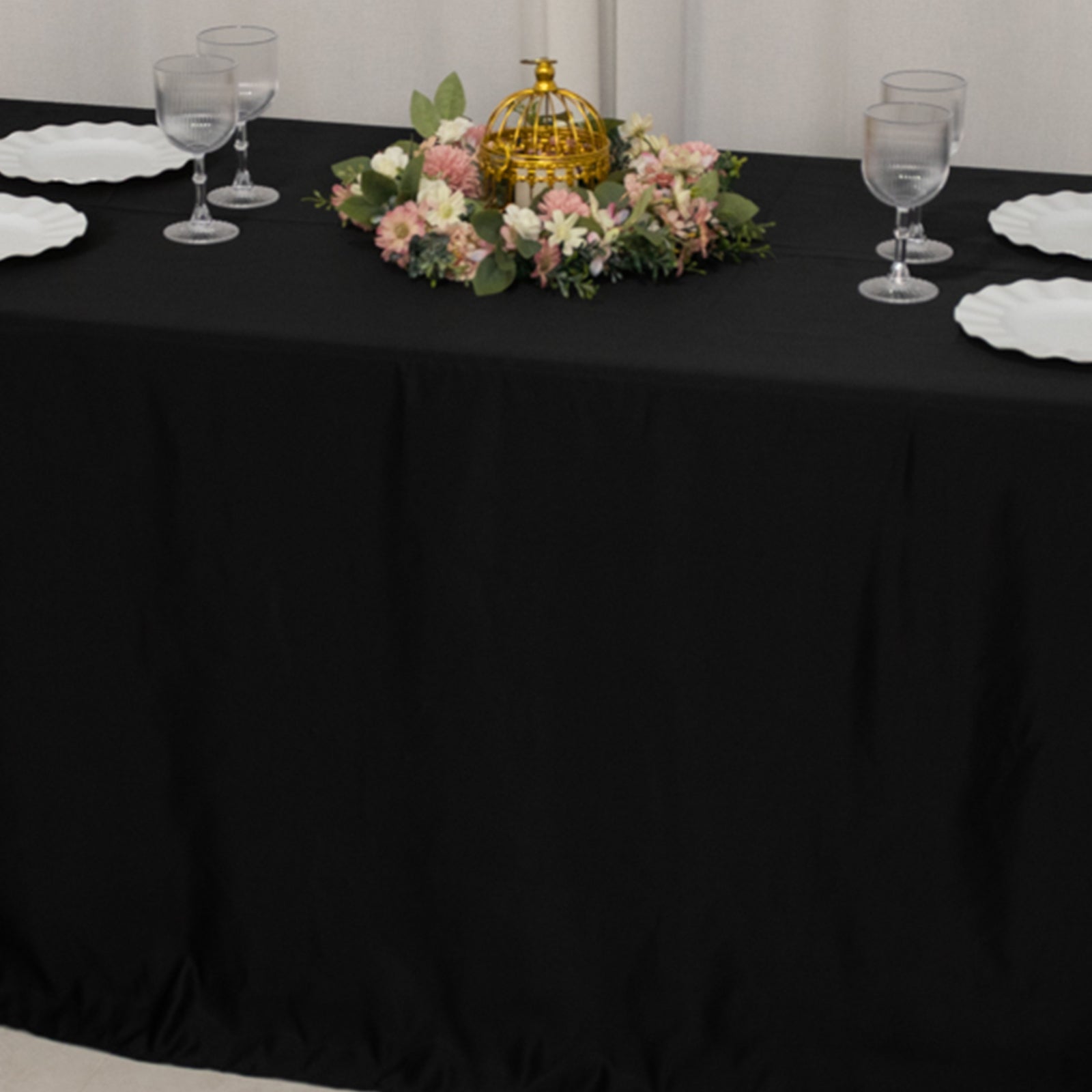 Black satin tablecloth for a 6-foot table with floral centerpiece.