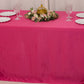 Fuchsia seamless satin tablecloth for 6-foot table with floor-length drop.