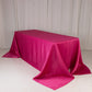 Fuchsia satin tablecloth for 6-foot table with floor-length drop.